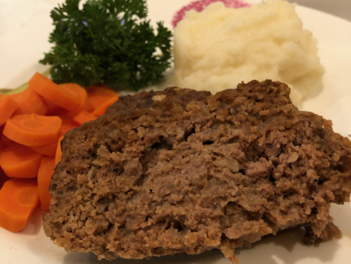 meatloaf, carrots, mashed potatoes on plate