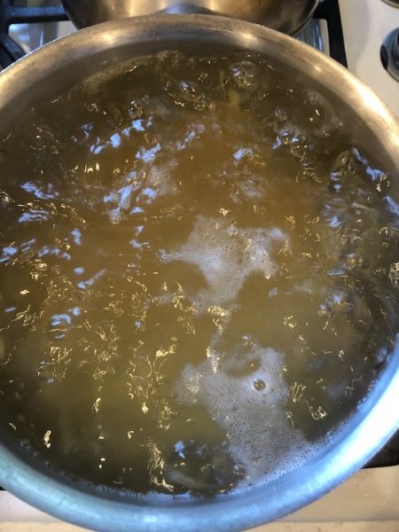 boiling water in pot with pasta added