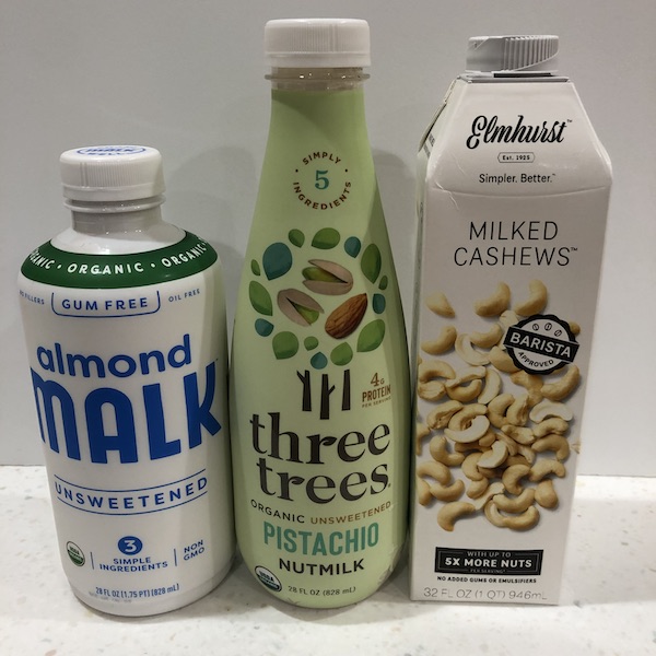 Three high fat nut milks in a row: almond, pistachio, cashew