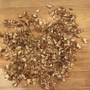 chopped pecans on cutting board