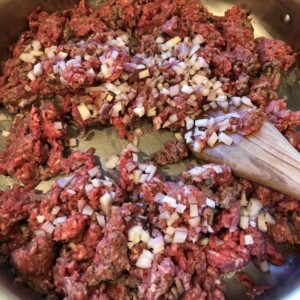 gr beef and shallots in pan to be browned